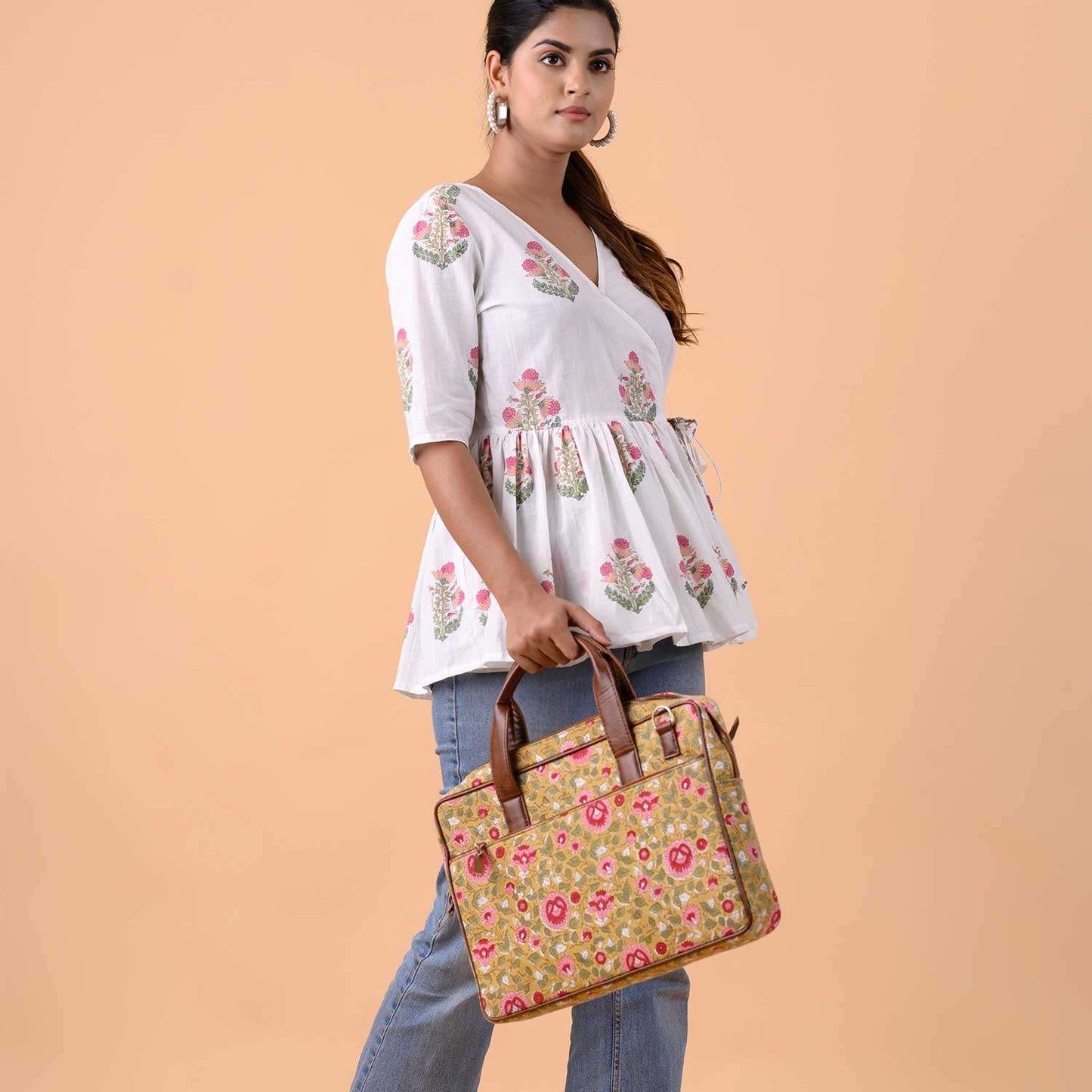 BLOSSOMING ROSES IN BASANT LAPTOP BAG 13″